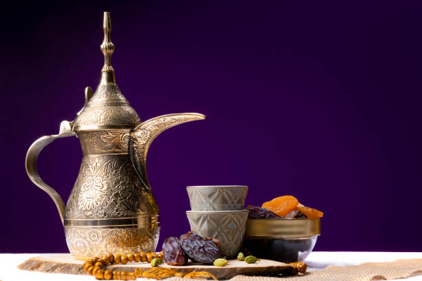 Eid and Ramadan set with Arabian coffee and dates set in dark background Eid and Ramadan set with Arabian coffee and dates set in dark background. Festive greeting card, an invitation for Muslim holy month Ramadan Kareem or Eid al Adha and Eid al fiter eid adha stock pictures, royalty-free photos & images