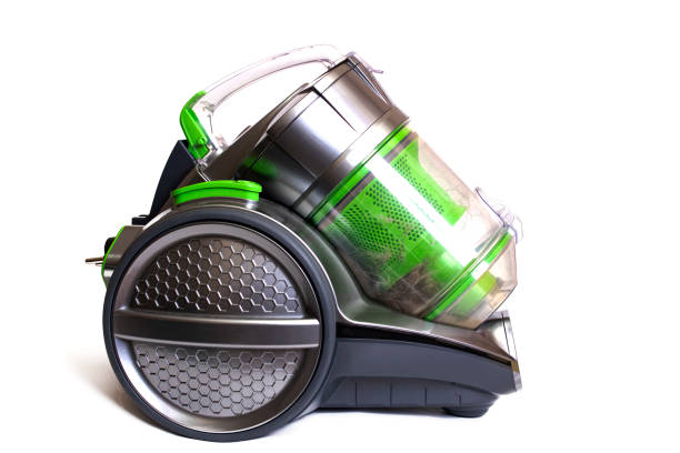 istock Green vacuum cleaner isolated on white background 1313818716