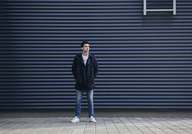istock stylish young man in a coat 1313823180