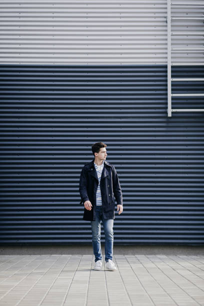 istock Fashionable young man in jeans 1313823193