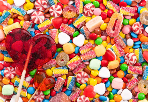 istock Colorful lollipops and different colored round candy. 1313823260
