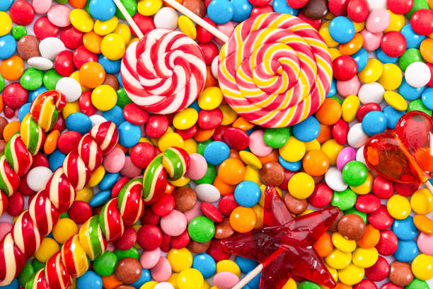 istock Colorful lollipops and different colored round candy. 1313823262