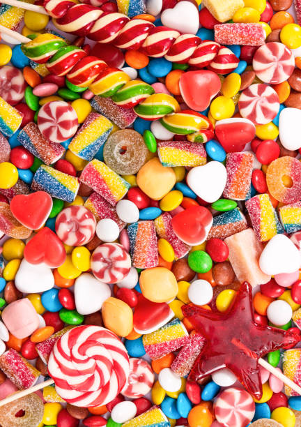 istock Colorful lollipops and different colored round candy. 1313823263