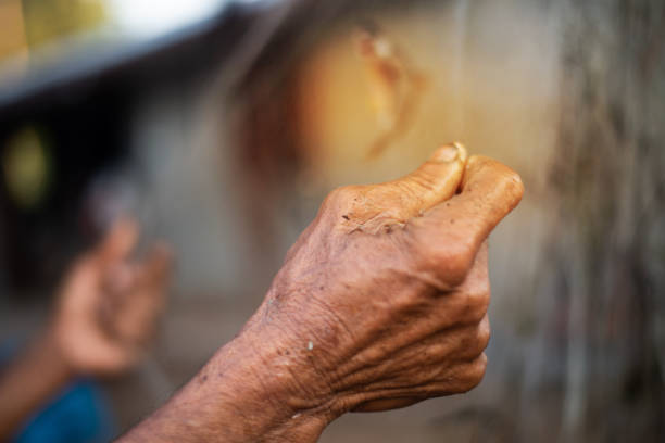 istock Close up hand Thai fisherman. 1313824575