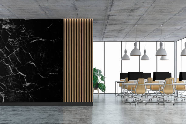 istock Empty office interior with copy space and wordesks on concrete floor 1313826544