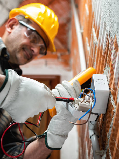 istock Electrician at work in an electrical system of a construction site. Construction industry. 1313827554