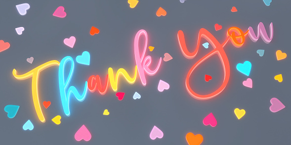 The words 'Thank You' written in three dimensional multi-coloured glowing neon letters In a script font written diagonally across the image, surround by smaller multi-coloured glowing hearts of varying sizes. On a plain grey background.