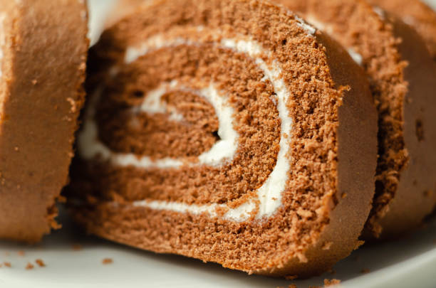 istock Chocolate sponge roll with a vanilla flavour filling, chocolate swiss roll 1313830062
