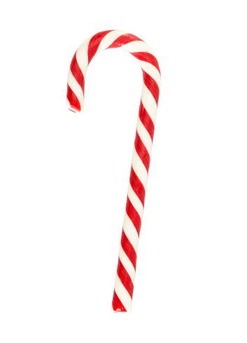 Sweet Christmas white and red caramel candy cane isolated on white background.