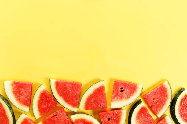 istock Sliced watermelon on yellow background, top view 1313835890