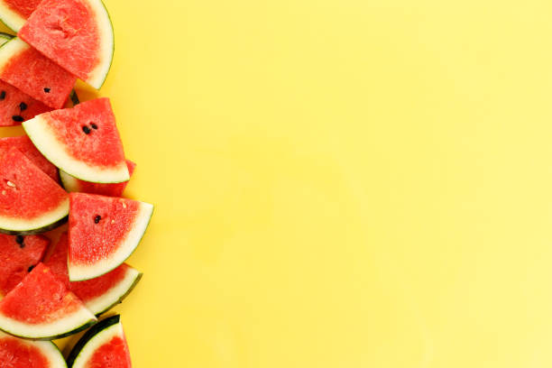 istock Sliced watermelon on yellow background, top view 1313835894