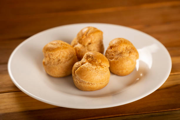 istock Delicious profiteroles on the table. 1313841556
