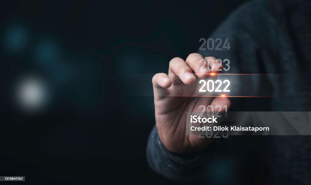 Businessman holding infographic  2022 year,Preparation Merry Christmas and happy new year concept. 2022 Stock Photo