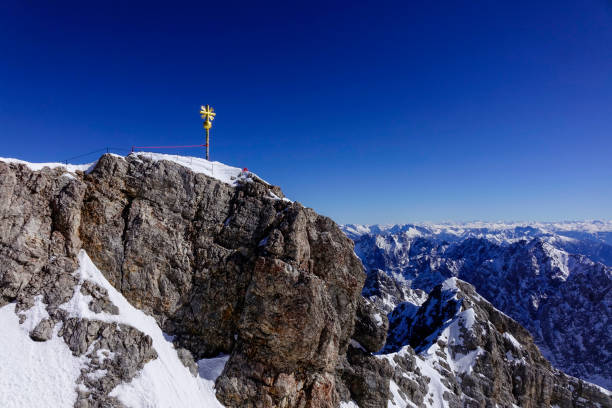 istock Summit cross on the Zugspitze, Bavaria, Germany 1313844286