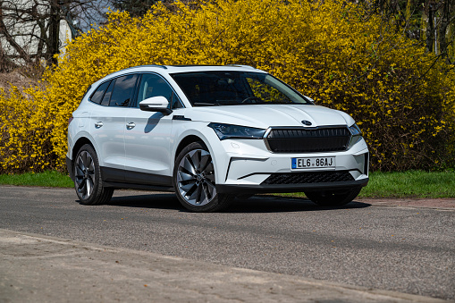 Berlin, Germany - 19th April 2021: Electric car Skoda Enyaq iV on a street in spring scenery. This model is a first mass-produced electric SUV from Skoda.