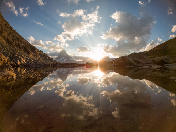 istock Perfect reflection of the Matterhorn on lake surface 1313846987