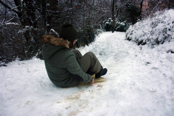 istock sledding along a trail covered with white snow in the mountains in winter or maybe cold spring 1313850853