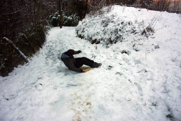 istock sledding along a trail covered with white snow in the mountains in winter or maybe cold spring 1313853086