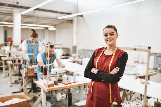 istock Female Textile Worker Supervisor And Her New Male Subordinates 1313854627
