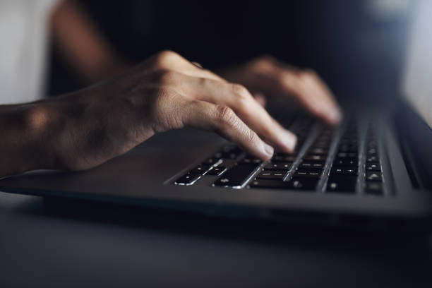 istock Cropped shot of a businessman typing on his laptop 1313856473