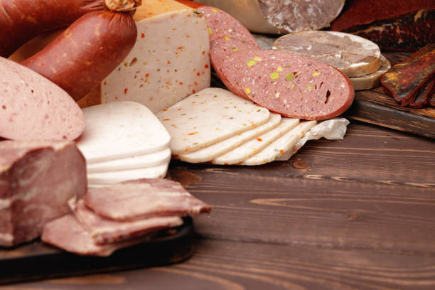 istock Variety of meat and sausage products on table 1313856493