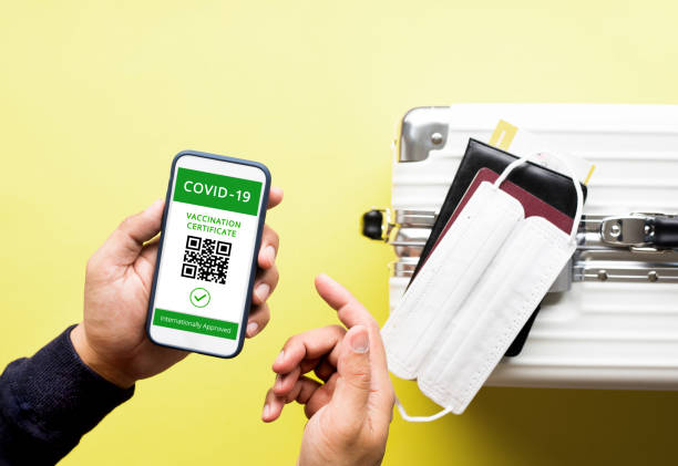 Health passport or vaccination approved for traveler with coronavirus outbreak.protection or security in pandemic situation. Health passport or vaccination approved for traveler with coronavirus outbreak.protection or security in pandemic situation.global cooperation. priority baggage tag stock pictures, royalty-free photos & images