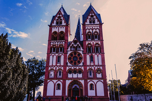 The Catholic Cathedral of Limburg, also known as Georgsdom in German after its dedication to Saint George, is located above the old town of Limburg in Hesse, Germany. It is the cathedral of the Catholic Diocese of Limburg. Its high location on a rock above the river Lahn provides its visibility from far away.