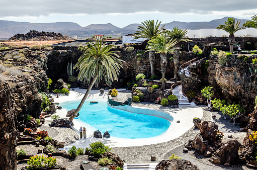 Lanzarote, June 10, 2013. Aerial view of the pool and gardens of Los Jameos del Agua, at the time an area used as a landfill and converted by César Manrique into one of the most emblematic places on the island. It shows how an unappreciated place can become a space that is a pleasure for the senses.
