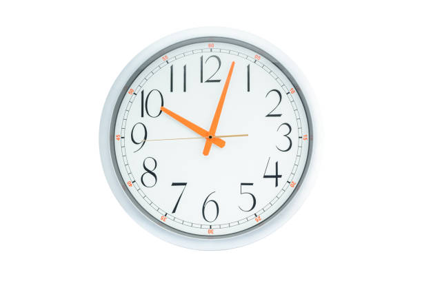 istock Analog or mechanical clock with orange colored short and long minute and hour clock hands on a face dial. Isolated on white background.  A clock is an instrument to measure, keep and indicate time. 1313866813
