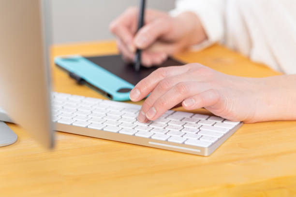 istock Hand of graphic designer working with stilus and tablet 1313867256