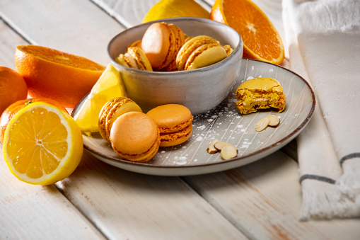 Citrus Macaron cookies sweet pastry with orange and lemon fruit stock photo