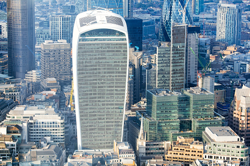 City of London from above, skyscrapers in financial district are visible in foreground, elevated view, England.