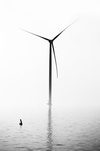 Construction of new wind turbines at the Ijsselmeer, Breezanddijk, Holland