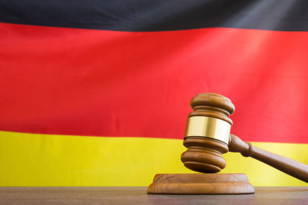 istock Judge gavel against German flag 1313880228