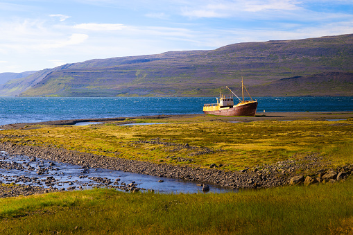An old ship wreck on the northern coast of Iceland in the Westfjords region, located near the town of Patrekfjordur.