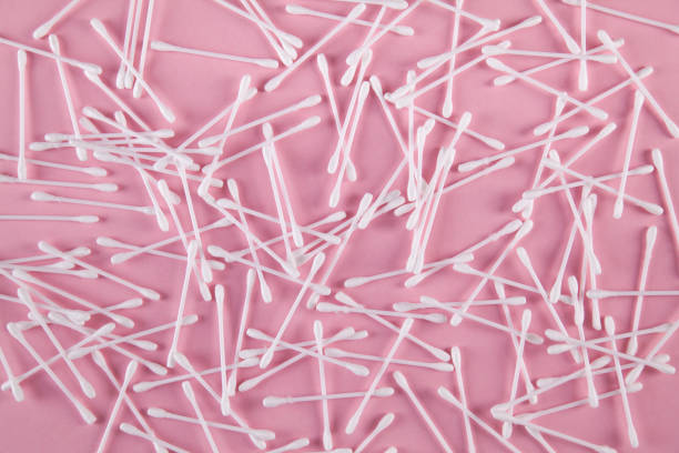 istock Cotton ear sticks, pink background. 1313883786