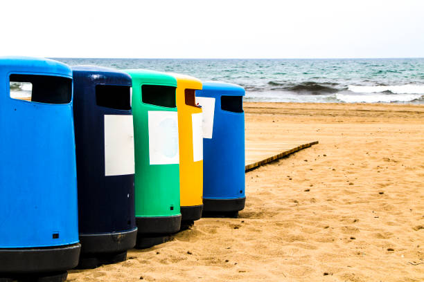 istock Colorful Wastebaskets and walkway to the beach 1313884152