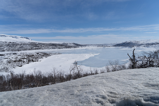 View of the frozen lake Sløddfjorden near the village of Haugastøl, in the municipality of Hol, Viken County, Norway.