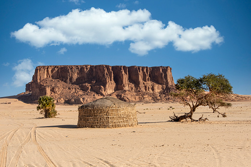 Remote hut of nomadic Tubu people in the Kalait region, Northern Chad.