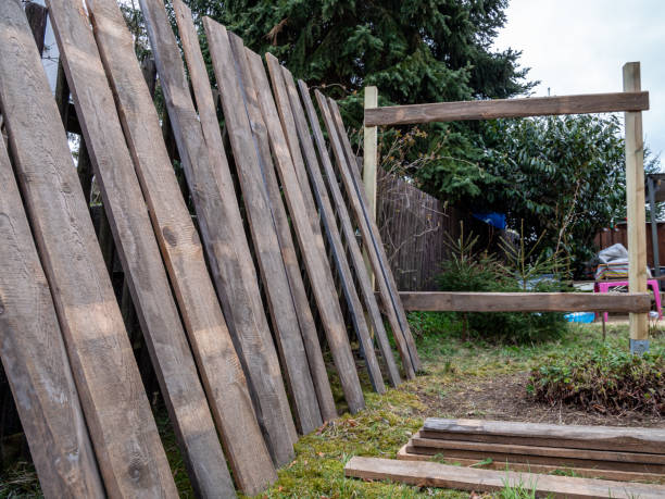 istock Fence construction in the garden at the house 1313891035