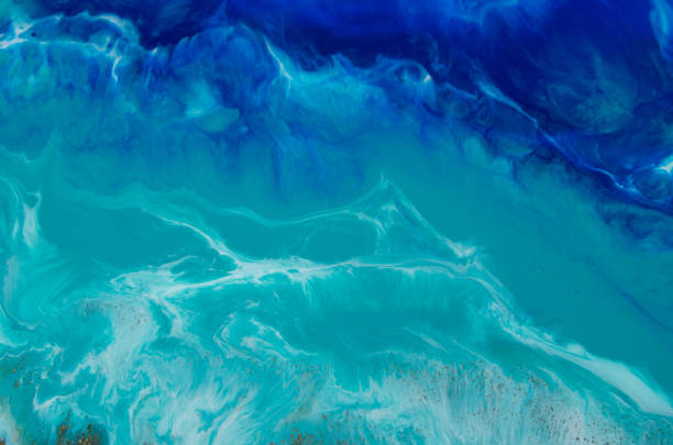 epoxy resin art. imitation of the sea. sea foam. modern trendy hobby. macro photo - horizontal blue turquoise painted image imagens e fotografias de stock