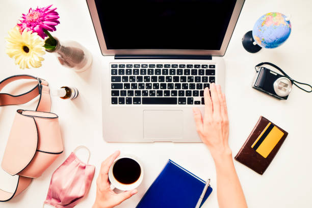 istock Travel reporter, journalist write blog or newspaper article on laptop computer. Blank space desktop black screen.. 1313892431