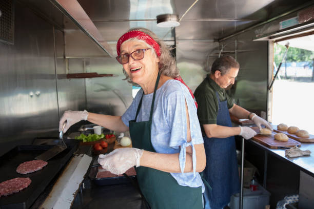 istock people working inside food truck 1313892629