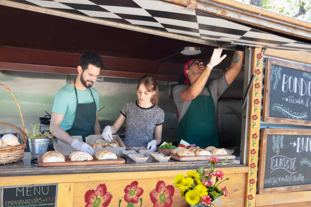 istock people working inside food truck 1313892817