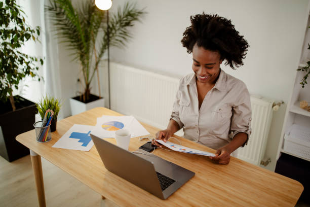 istock Young Afro American architect work project. Photo woman working with new startup project. 1313895413