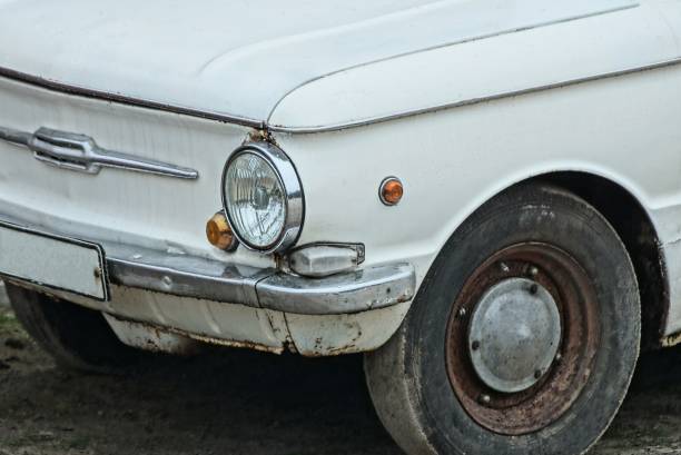 istock part of an old car with a bumper round headlight 1313898727