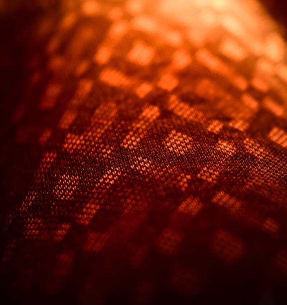 istock Orange black textured clothes surface unique photo 1313898907
