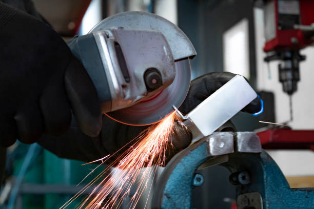 istock Close-up shoot of an unrecognizable worker cutting metal with a grinder 1313899063