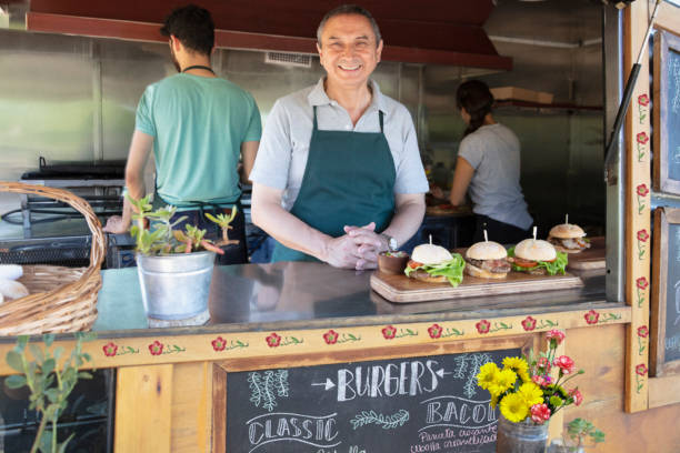 istock Senior man inside food truck 1313900020