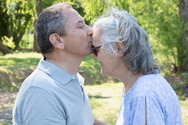 istock Senior couple having fun outside at the park 1313900257